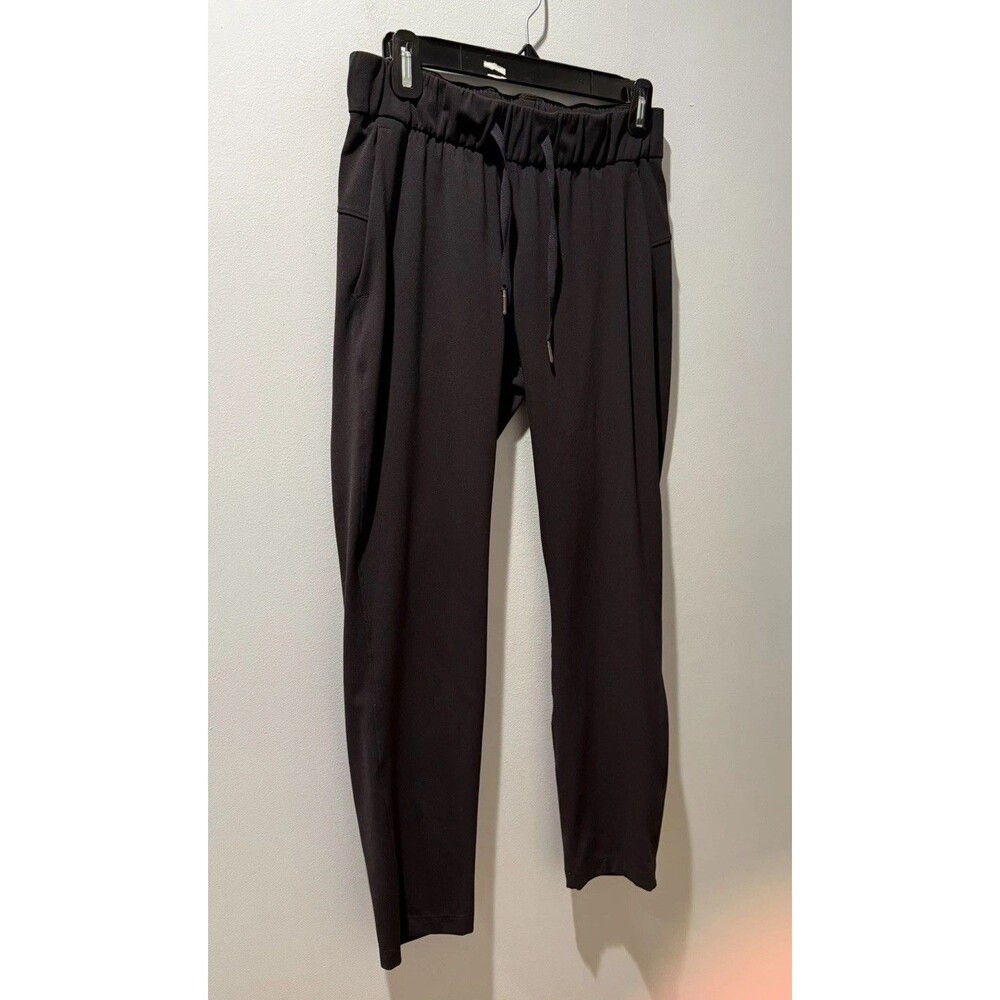 Lululemon On The Fly Pants Brown Straight Leg Stretch Travel Pant Women’s Size 4